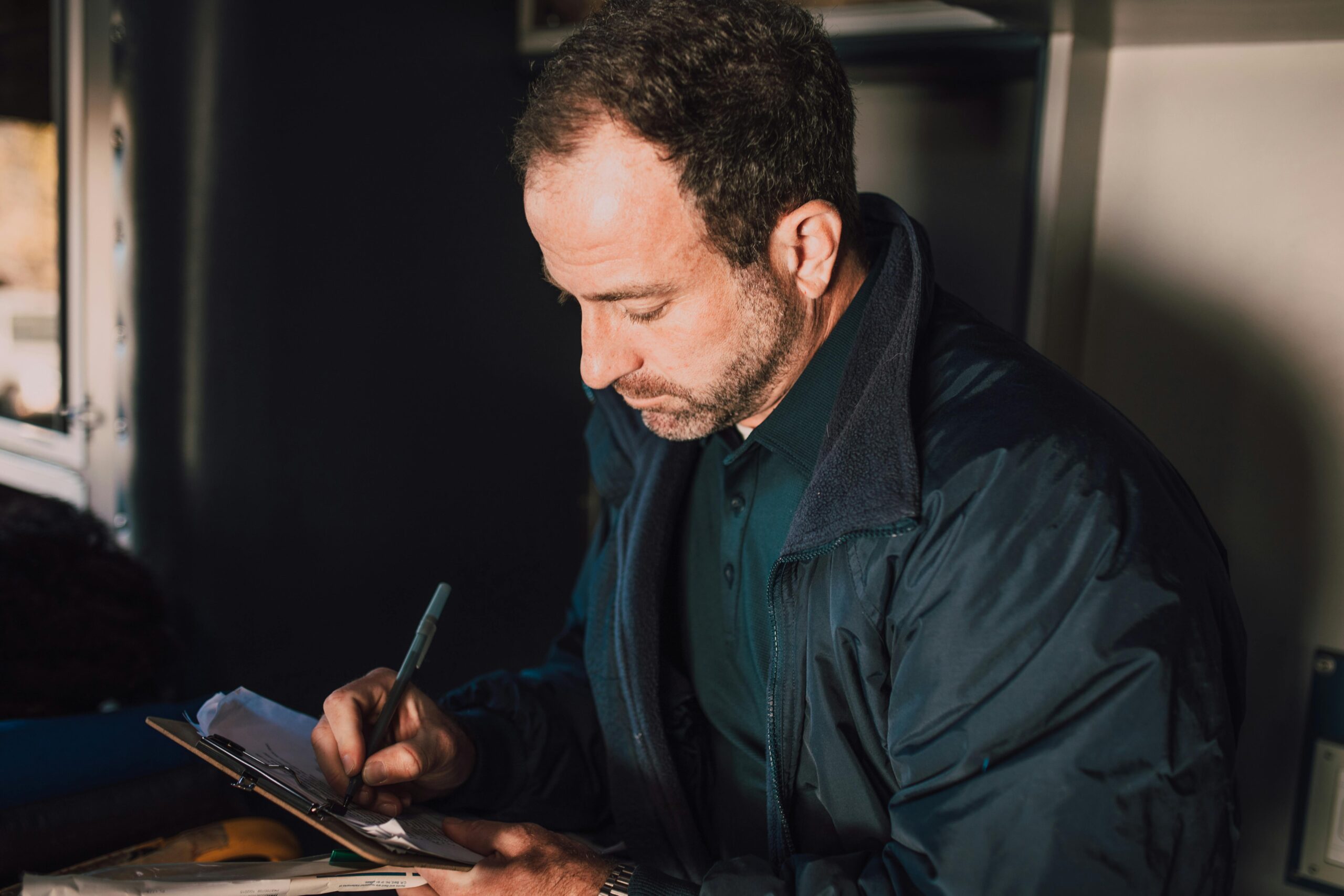 Home inspector student reviewing course material